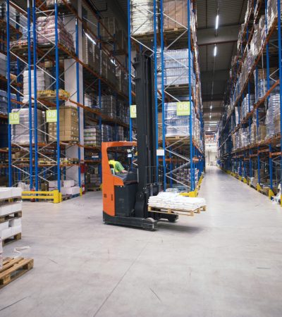 industrial-building-large-warehouse-interior-with-forklift-palette-with-goods-shelves (1)